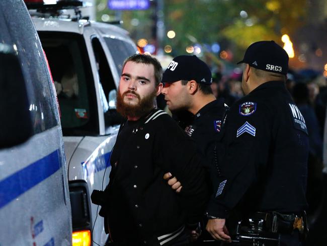 Police arrest a protester rallying against President-elect Donald Trump in New York City on November 9, 2016. Picture: AFP