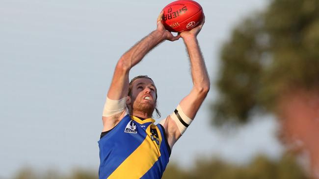 Peter Faulks grabs a mark during his days at Williamstown. Picture: Stuart Milligan