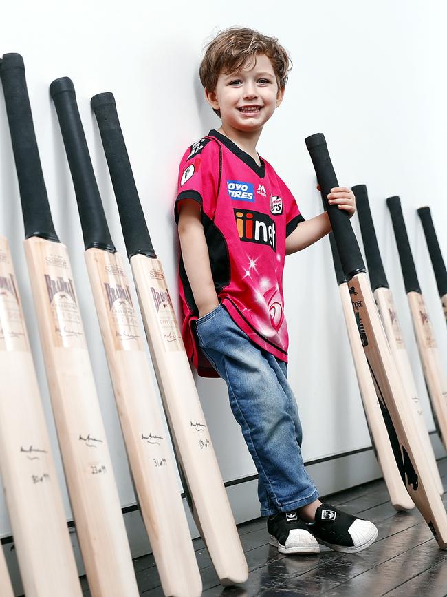 Jamison Makomaski, 4, with the signed bats. Picture: Sam Ruttyn