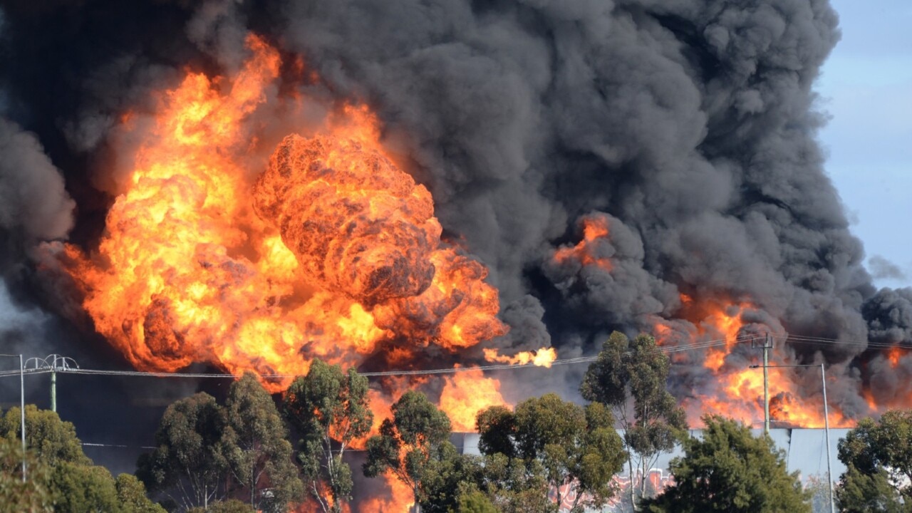 Watch and act alerts issued as toxic smoke from factory fire blows in Derrimut