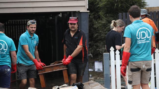 Cleaning up in Vincent St, Auchenflower. Picture: Annette Dew