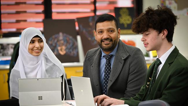 5/62024: Islamic College of Brisbane CEO Ali Kadri with students (L) Rahma Ibrahim, Year 10, and Ashratullah Walid Noori, Year 12. Picture: Lyndon Mechielsen / The Australian