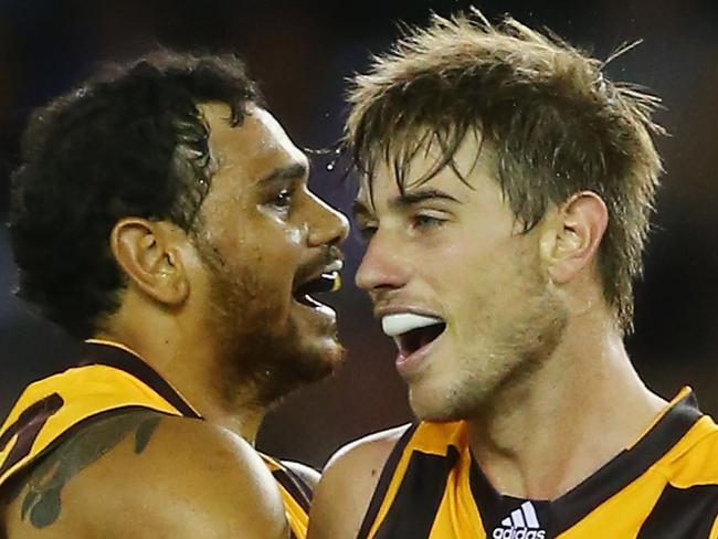 MELBOURNE, AUSTRALIA - MARCH 12: Ryan Schoenmakers of the Hawks celebrates a supergoal with Cyril Rioli (L) during the NAB CHallenge AFL match between the Hawthorn Hawks and the North Melbourne Kangaroos at Etihad Stadium on March 12, 2016 in Melbourne, Australia. (Photo by Michael Dodge/Getty Images)