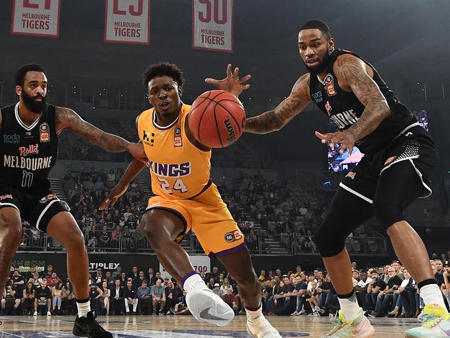 Sydney Kings star Jae'Sean Tate and Melbourne United star Shawn Long compete for the ball on Monday night. Picture: Getty Images