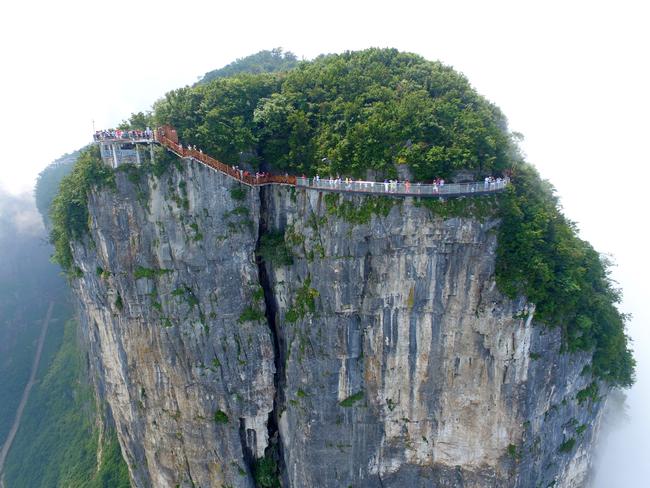 The skywalk wraps around Tianmen Mountain in Zhangjiajie National Forest Park. Picture: Shao Ying/Imagine China