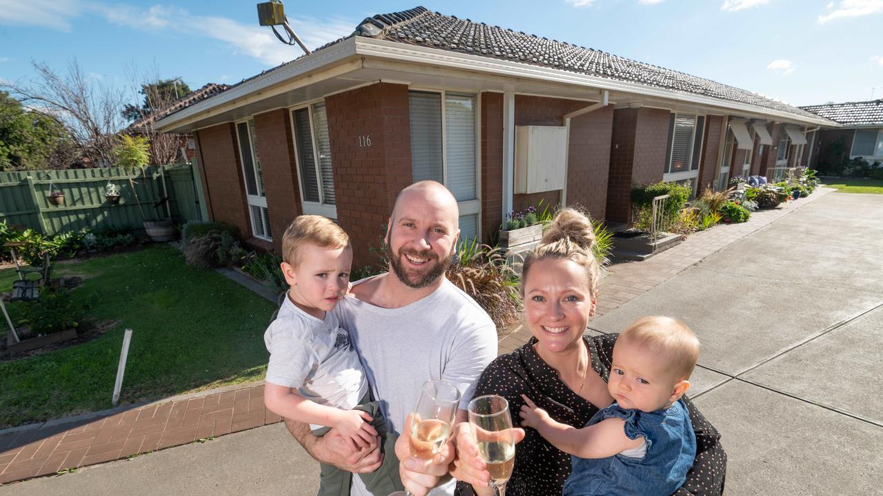 Sam and Nick Saunders with kids, Hudson, 3, and Quinn, 9 months, sold their first home on Saturday. Picture: Tony Gough