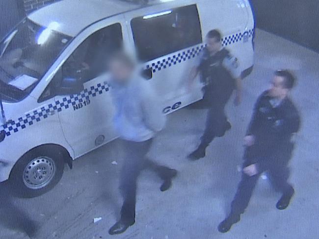 Matthias Ungemach being led into Manly Police Station after his arrest in July 2020. Picture: NSW Police