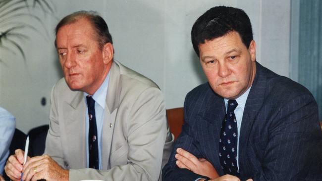 Tim Fischer and then-Liberal Party leader Alexander Downer and sit with stony silence between them in Adelaide, 13 Dec 1994.