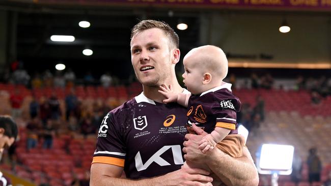 Billy Walters with son Hugo after his Broncos debut. Picture: Bradley Kanaris/Getty Images