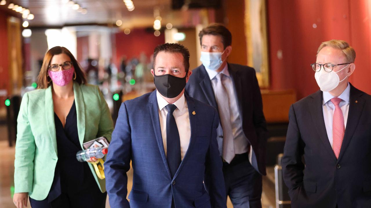 Paul Toole (second from left) walks into the Nationals party meeting with colleagues. Picture: NCA NewsWire / Damian Shaw