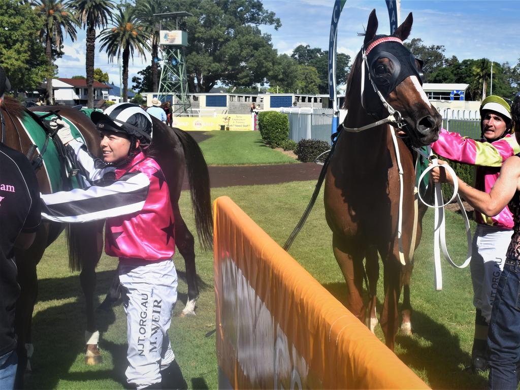 Runner up Mikayla Weir (Manly Hanover) and winner Luke Rolls (Great Marlow) pass on their feedback to connections after the New Member Benefits CG&amp;E Class 1 Handicap at Clarence River Jockey Club in Grafton on Tuesday, 2nd February, 2021. Photo Bill North / The Daily Examiner