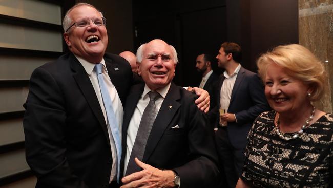 Scott Morrison shares a laugh with John Howard after his election victory. Picture: Adam Taylor/PMO