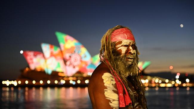 Koomurri performer Les Daniels on the Sydney Harbour foreshore this morning. Picture: NCA NewsWire / Jeremy Piper