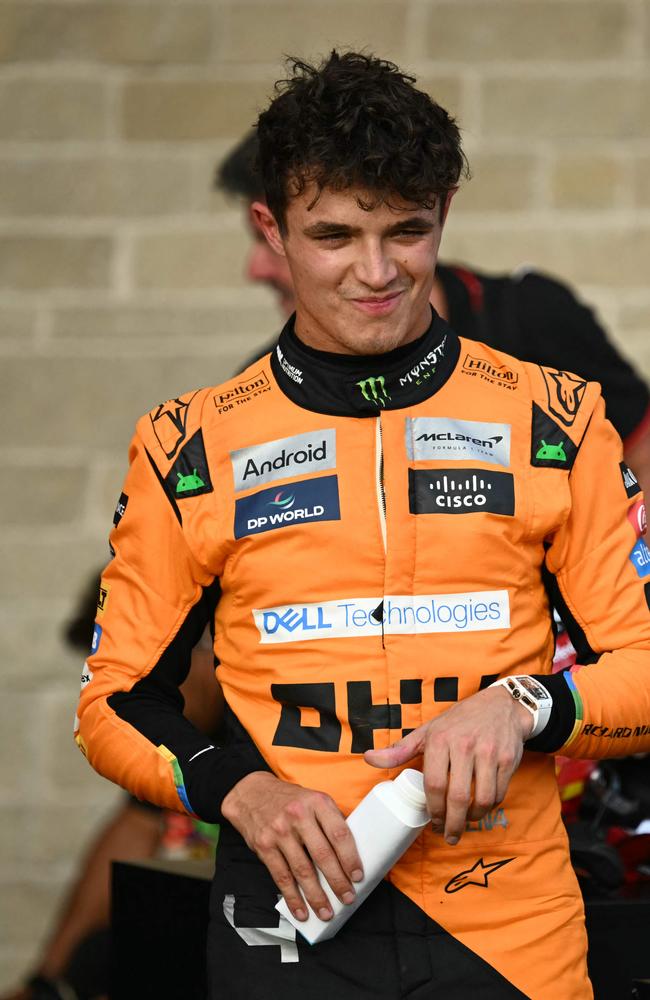 McLaren's British driver Lando Norris should have handed back the position. (Photo by Patrick T. Fallon / AFP)