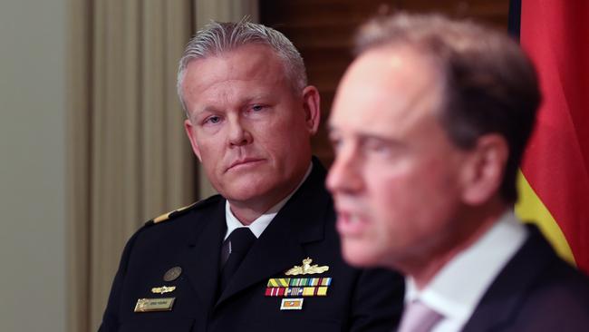 Health Minister Greg Hunt, right, and Commodore Eric Young. Picture: David Crosling