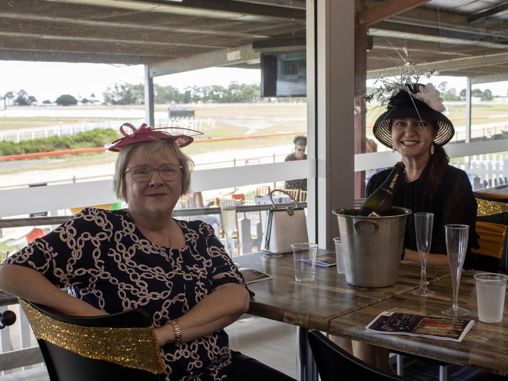 Sarah Smith and Kirsty Lyne at the Bundaberg Catholic Schools Race Day.