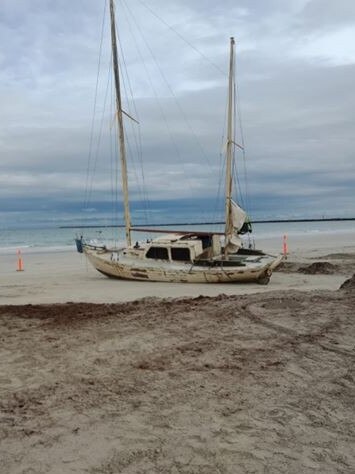 The boat after the tide washed sand back around it on Friday night. Picture: Supplied