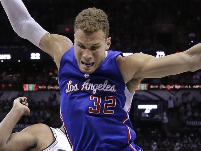 Los Angeles Clippers' Blake Griffin (32) is fouled by San Antonio Spurs' Boris Diaw, left, as he tries to score during the first half of Game 6 in an NBA basketball first-round playoff series, Thursday, April 30, 2015, in San Antonio. (AP Photo/Darren Abate)