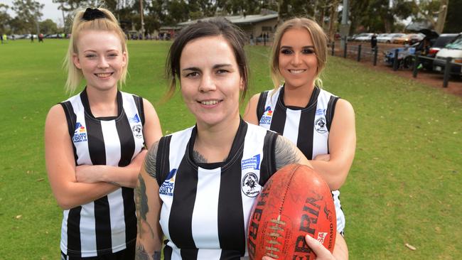 Salisbury SAWFL players Kyra Hickey, Kayla Anderson and Shantera Zeneli. Picture: AAP/Brenton Edwards.