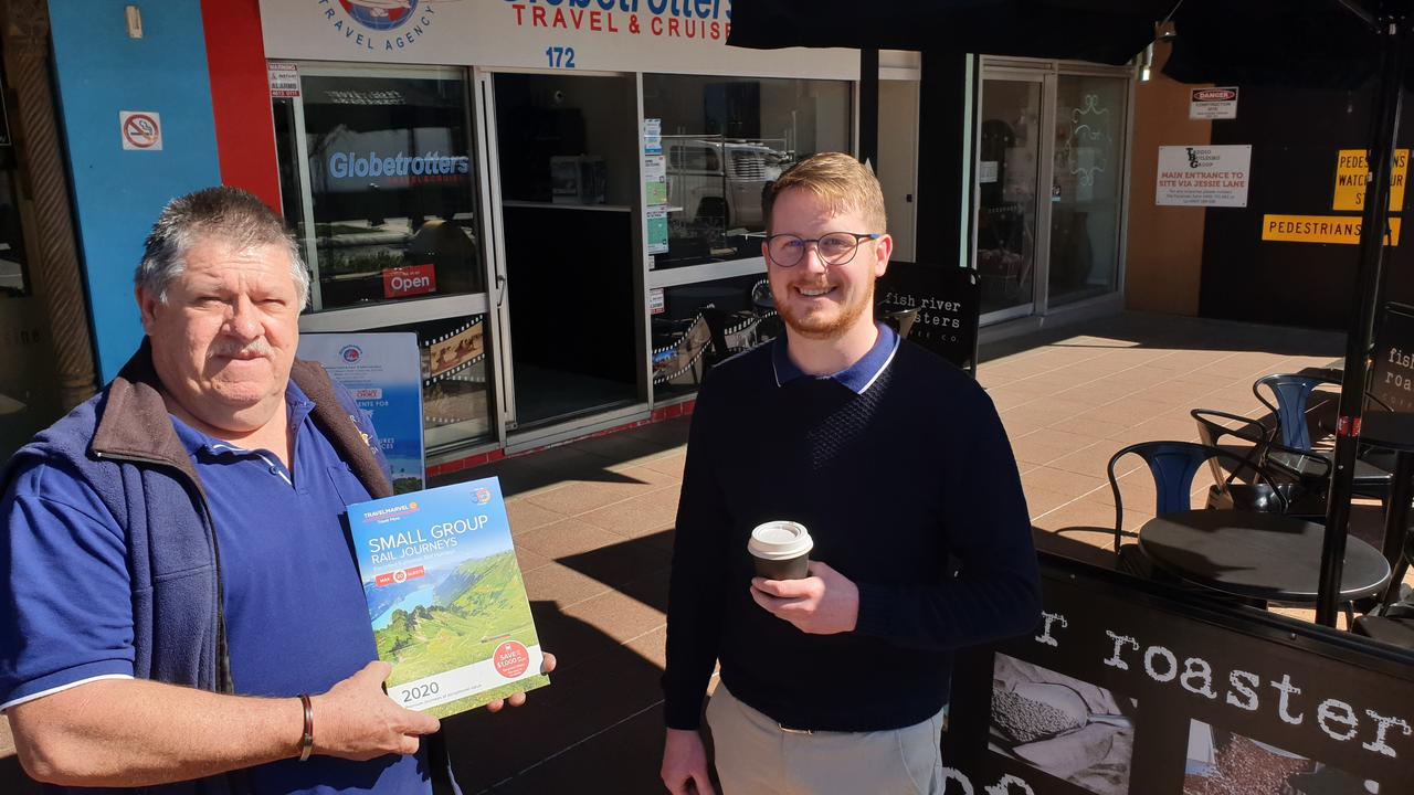 Ben Apsey (right) has opened Travel Mugs Coffee on Margaret St, as a sublease of his father Paul's agency Globetrotters Travel and Cruise Toowoomba.