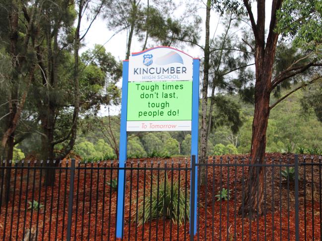 The sign outside the school.