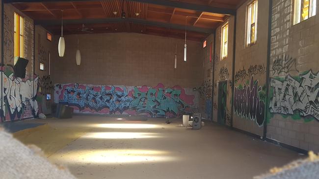 Graffiti is spread across many of the walls inside the former Heathmont Anglican Church. Picture: Kiel Egging.