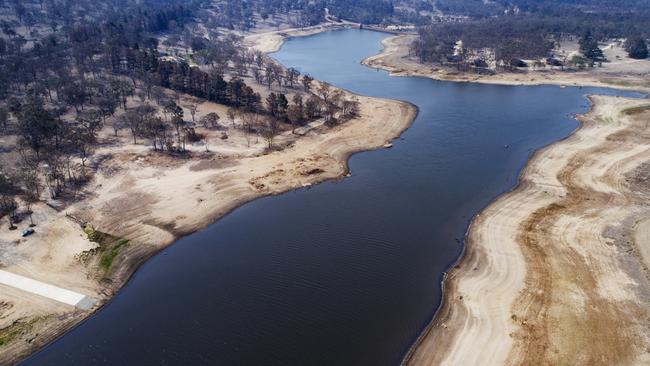 The rapidly receding Storm King Dam at Stanthorpe. Communities across Queensland are running dangerously low on water, while southeast Queensland’s usage has increased in recent months. Picture: Lachie Millard