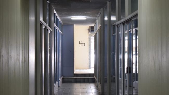 Swastika graffiti in the Cherry Lane Arcade on East St, Rockhampton City. Picture: Aden Stokes