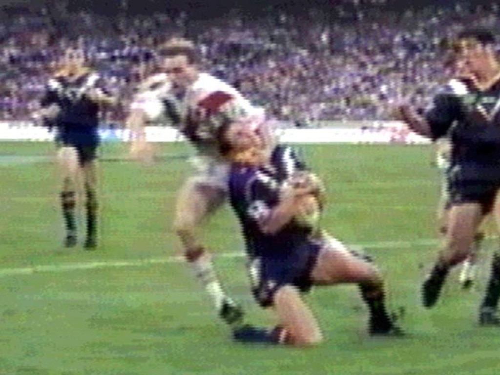 The Dragons are awarded a matchwinning penalty try in the 1999 grand final after Dragon Jamie Ainscough tackled Craig Smith high and knocked him out cold. Picture: Channel 9.