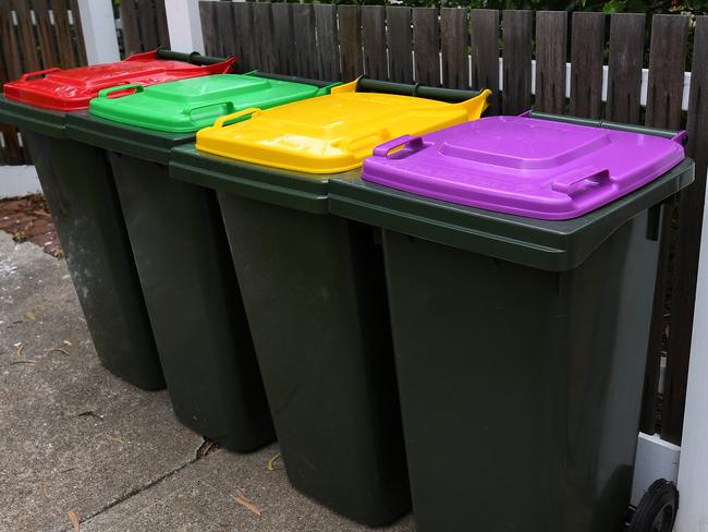 General view of the current and planned waste bins outside a property in Spotswood, Melbourne, Monday, February 24, 2020. Victoria, the only state or territory in Australia without a cash-for-bottles scheme, will get a container deposit scheme - but not for another three years. (AAP Image/James Ross) NO ARCHIVING