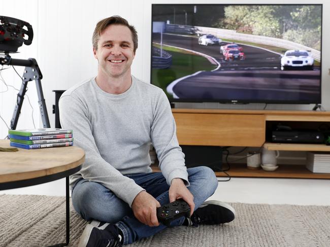 Embargoed for the The Sunday TelegraphPeter Anderson pre-ordered both of the new games consoles from Xbox and PlayStation, though he had some trouble getting the Xbox. Pictured gaming at his Dolls Point home. Picture: Jonathan Ng