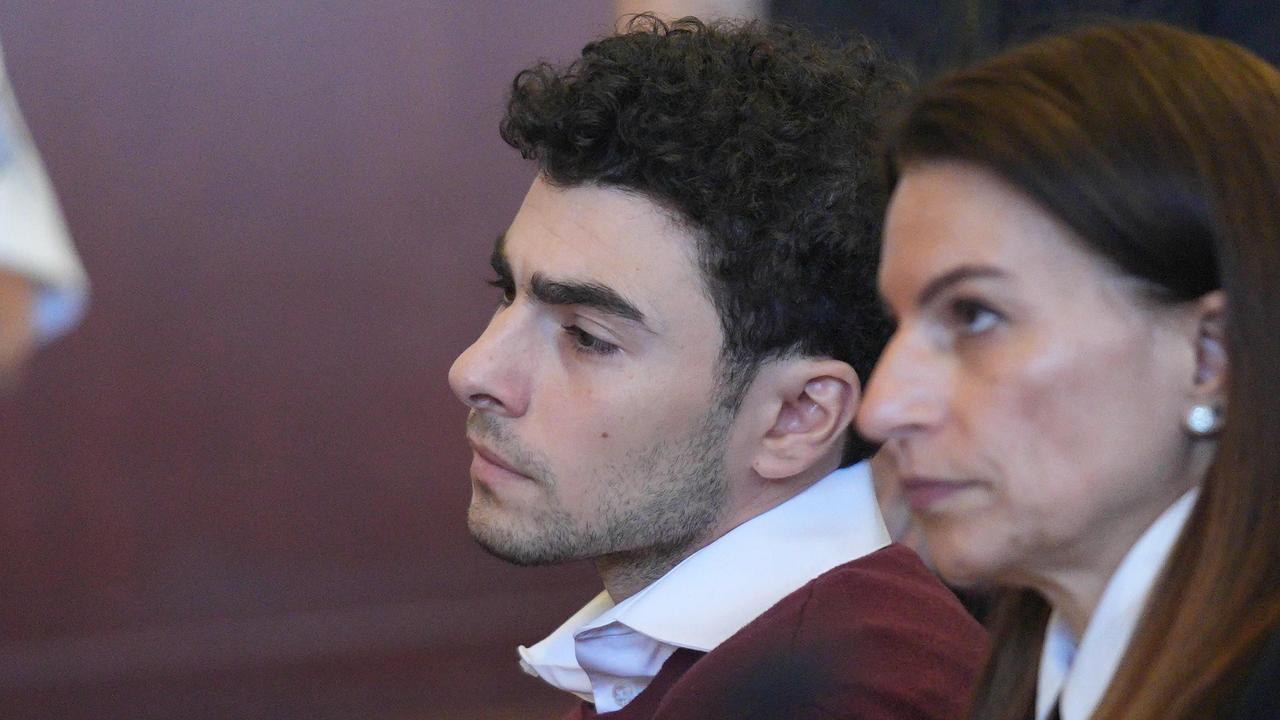 Luigi Mangione with his lawyer. (Photo by Curtis Means / POOL / AFP)