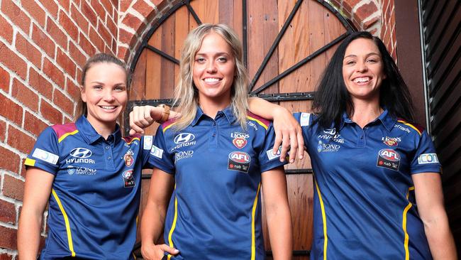 Emily Bates, Kaitlyn Ashmore, and Leah Kaslar, Brisbane Lions AFLW launch, Coorparoo. Photographer: Liam Kidston.