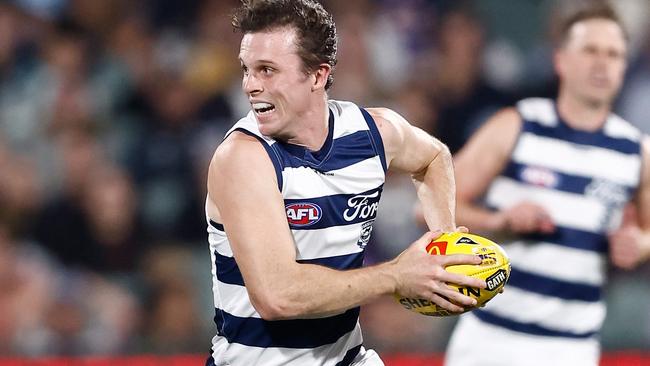 ADELAIDE, AUSTRALIA - APRIL 06: Max Holmes of the Cats in action during the 2024 AFL Round 04 match between the Western Bulldogs and the Geelong Cats at Adelaide Oval on April 06, 2024 in Adelaide, Australia. (Photo by Michael Willson/AFL Photos via Getty Images)