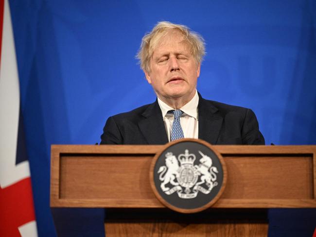 (FILES) In this file photo taken on May 25, 2022 Britain's Prime Minister Boris Johnson attends a press conference in the Downing Street Briefing Room in central London, following the publication of the Sue Gray report. - UK lawmakers announced on March 3, 2023, they will question former prime minister Boris Johnson over whether he lied about "Partygate", in a probe that could trigger his removal as a member of parliament. In an interim report released after eight months of work, parliament's "privileges" committee said the evidence so far undermined Johnson's pleas of innocence to the House of Commons. (Photo by Leon Neal / various sources / AFP)