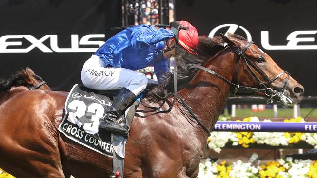 Kerrin McEvoy salutes as Cross Counter wins the Melbourne Cup. Picture: Alex Coppel