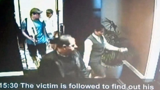 CCTV footage shows Mahmoud al-Mabhouh (front) as he is shown to his room while two suspected assassins, in tennis gea, follow him from the lift of his hotel in Dubai in 2010.