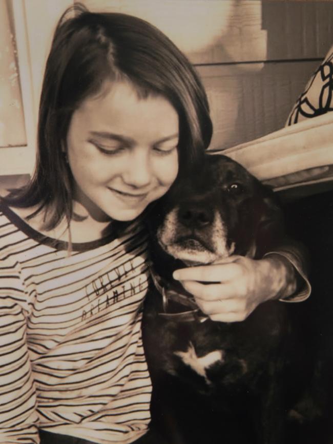 Biddy with her beloved dog. Picture: Supplied