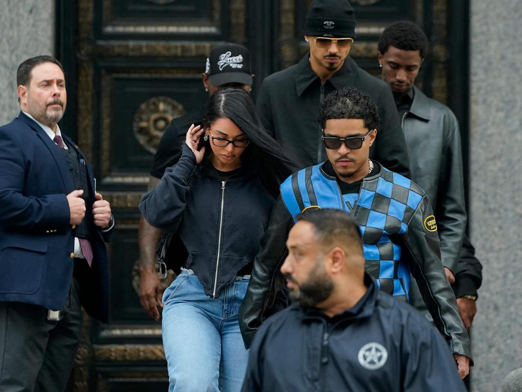 Diddy’s sons Justin Combs (C front) and Christian Combs (R, rear), leave federal court after their father's bail hearing in New York. Picture: AFP