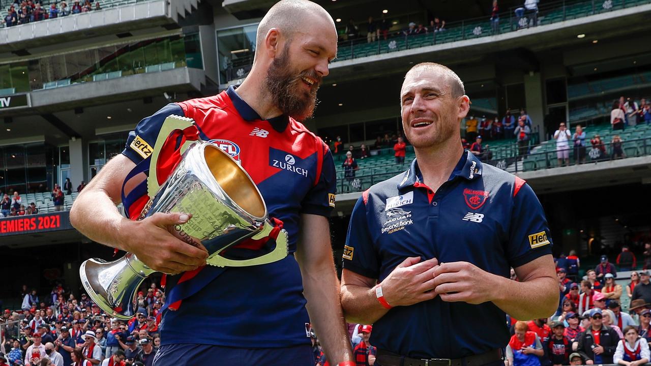 Max Gawn and Simon Goodwin celebrating the Demons premiership with fans at the MCG. Picture: Michael Willson/AFL Photos