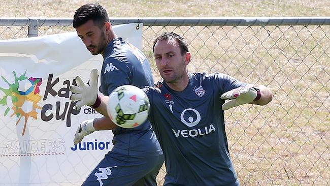 Former Adelaide United captain and now goalkeeper coach Eugene Galekovic training with Paul Izzo in 2014. Picture: Sarah Reed