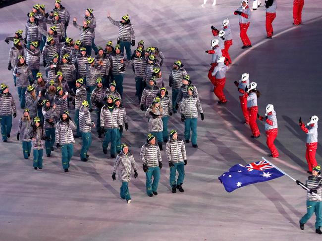 Flag bearer Scotty James of Australia and teammates enter the stadium during the Opening Ceremony of the PyeongChang 2018 Winter Olympic Games. Picture: Getty