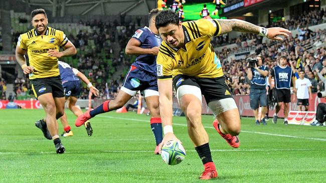 Hurricanes winger Ben Lam touches down for a try against the Rebels at AAMI Park. Picture: AAP