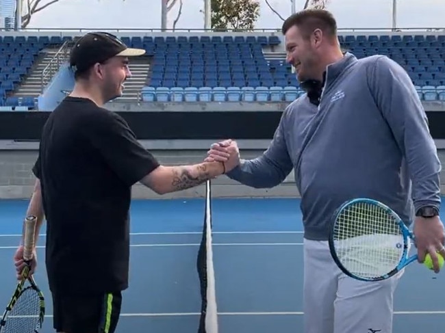 Mitch Clarke and Sam Groth playing a game at Melbourne Park.