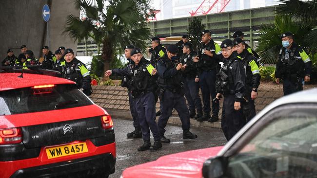 Police man a roadblock outside the West Kowloon Magistrates’ court in Hong Kong on Wednesday ahead of Jimmy Lai taking the stand in his collusion trial. Picture: AFP