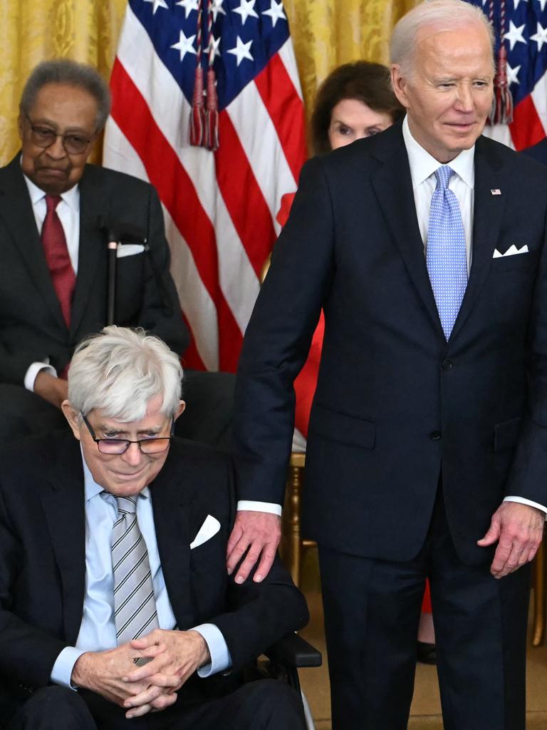 US President Joe Biden presents the Presidential Medal of Freedom to Donahue in May this year. Picture: AFP