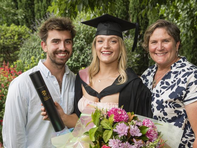 Bachelor of Education (Secondary) graduate Aleesha Masters is congratulated by partner Alex Price and mum Lindy Masters at a UniSQ graduation ceremony at Empire Theatres, Tuesday, February 13, 2024. Picture: Kevin Farmer