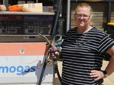 MOGAS Cookes Outback Motorsowner Kim Logan, pictured with local Jessie Evans, said the situation was dire for many of the residents. Picture: Supplied