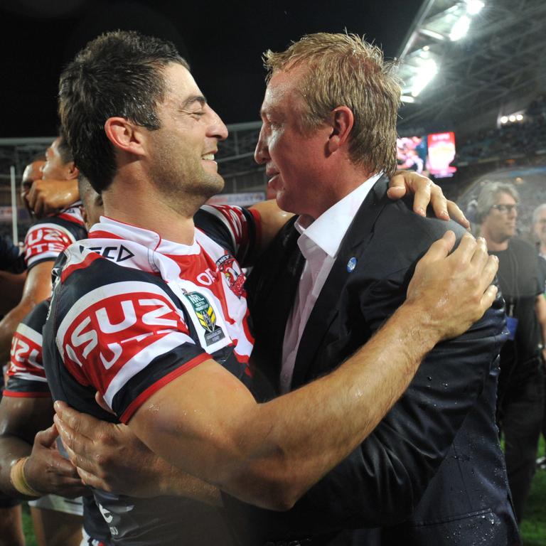 Anthony Minichiello (left) and Trent Robinson celebrate victory in the 2013 NRL Grand Final. Picture: AAP Image/Paul Miller