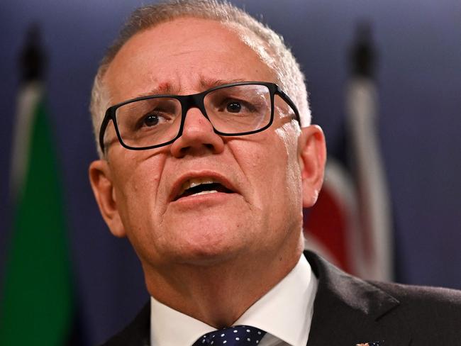 (FILES) Australia's former prime minister Scott Morrison speaks to media during a press conference in Sydney on August 17, 2022. (Photo by Steven Saphore / AFP)